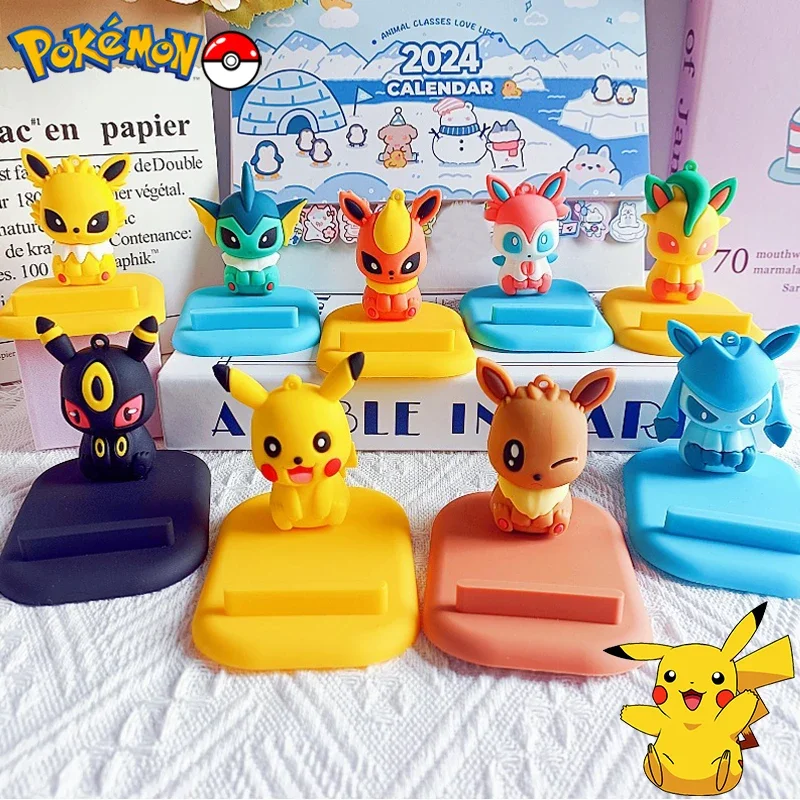 Pokemon Pikachu Supporti per cellulari Kawaii Cartoon Eevee Figura in PVC Supporti per telefono Telefono da tavolo Porta TV Accessori Regalo per ragazze