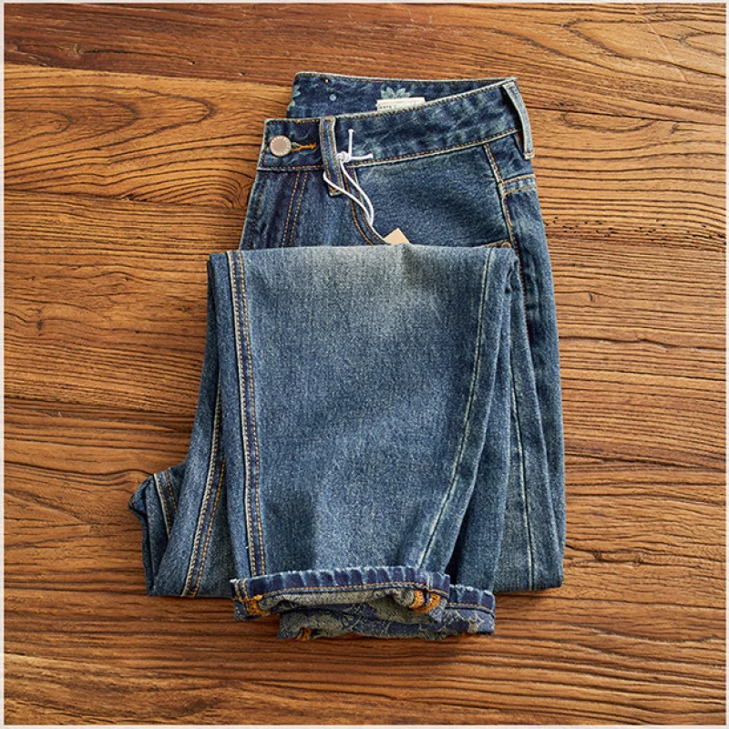

Fake hole sticking fabric retro distressed jeans for young men, heavy weight straight tube loose denim pants, 2025 autumn