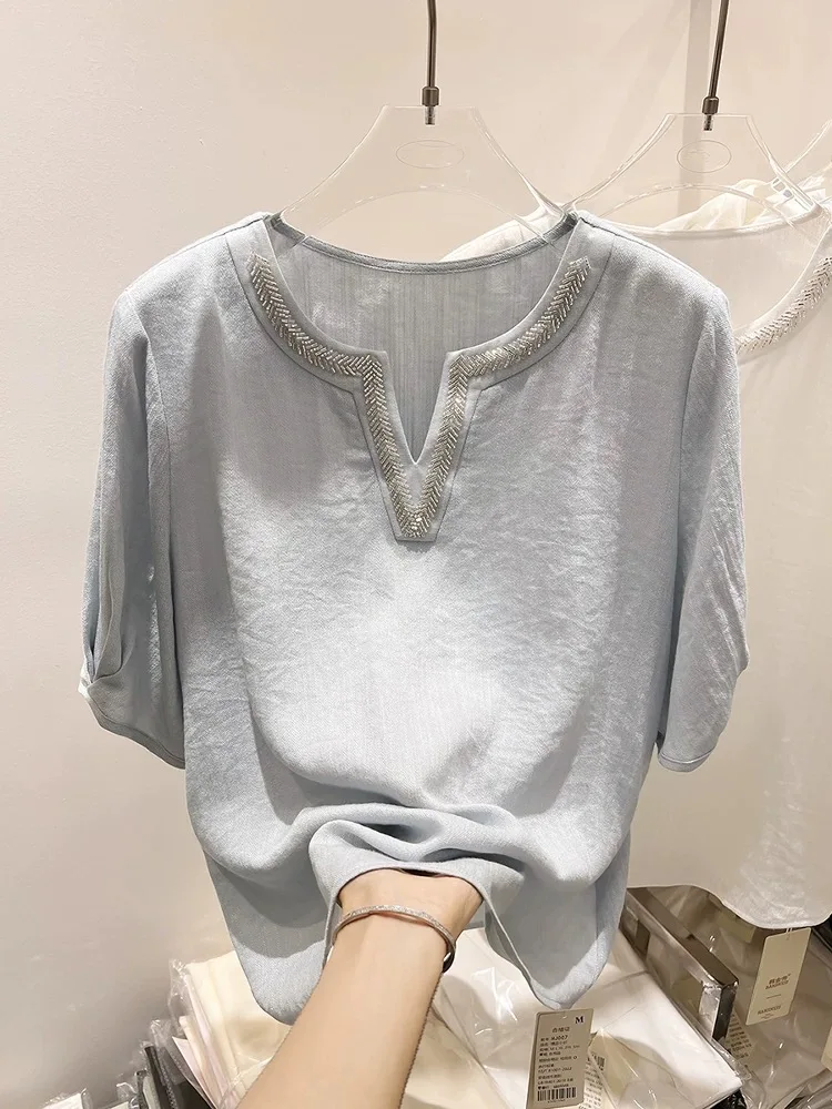 قميص نسائي فضفاض بأكمام قصيرة وياقة على شكل V، تصميم أصلي أنيق لفصل الصيف، مزين بالخرز والألماس، قميص أبيض فضفاض