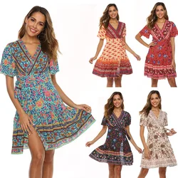Summer women's bohemian beach vacation style short sleeved deep V-hem pleated printed dress