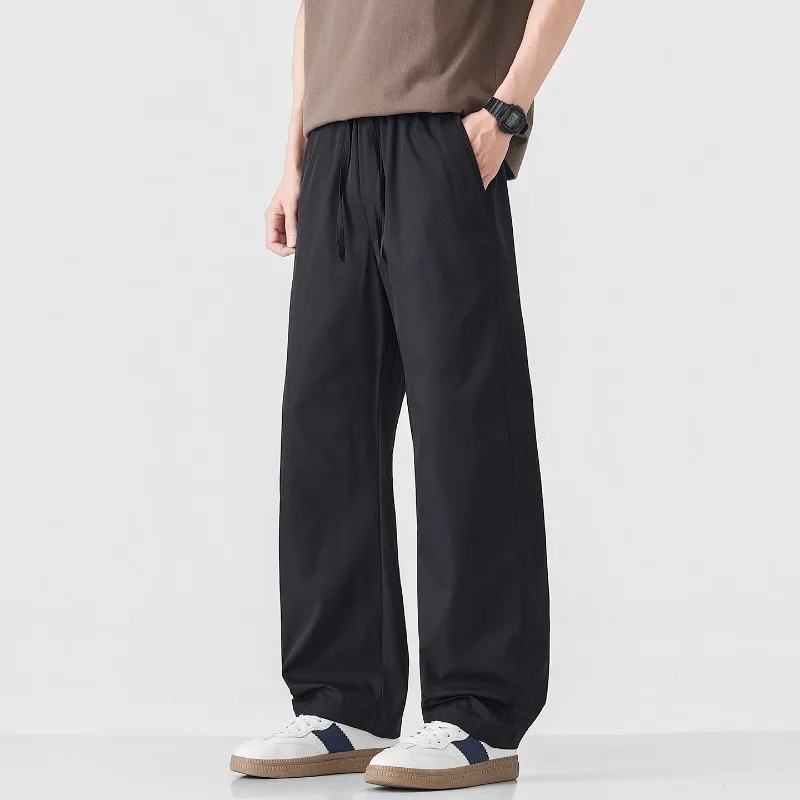 

Новые мужские брюки прямого кроя в винтажном стиле на весну-лето 2026: комфортные, с завязками и большими карманами