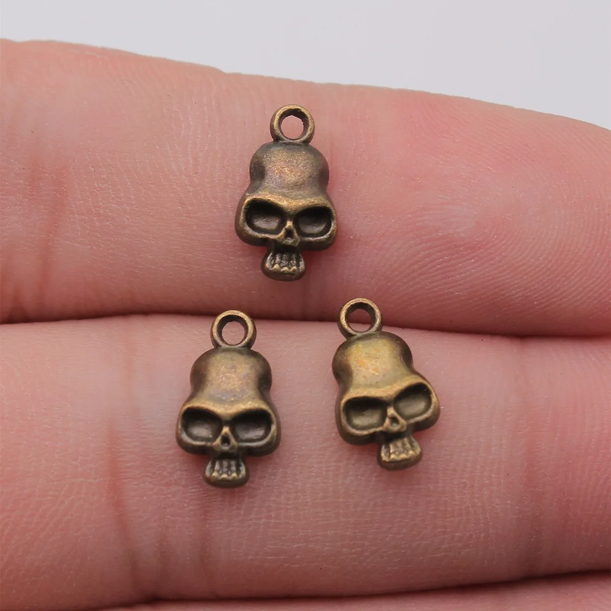 WYSIWYG 20 sztuk 13x7mm antyczne srebro kolor czaszki Charms mała czaszka Charms Tiny czaszki Charms dla tworzenia biżuterii — zdjęcie 7