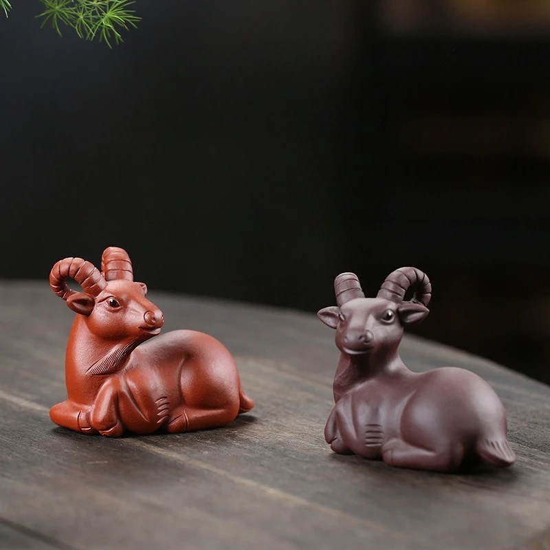 

Yixing purple sand tea pet sheep ornament twelve zodiac leaders money sheep sculpture creative model can raise tea play sheep