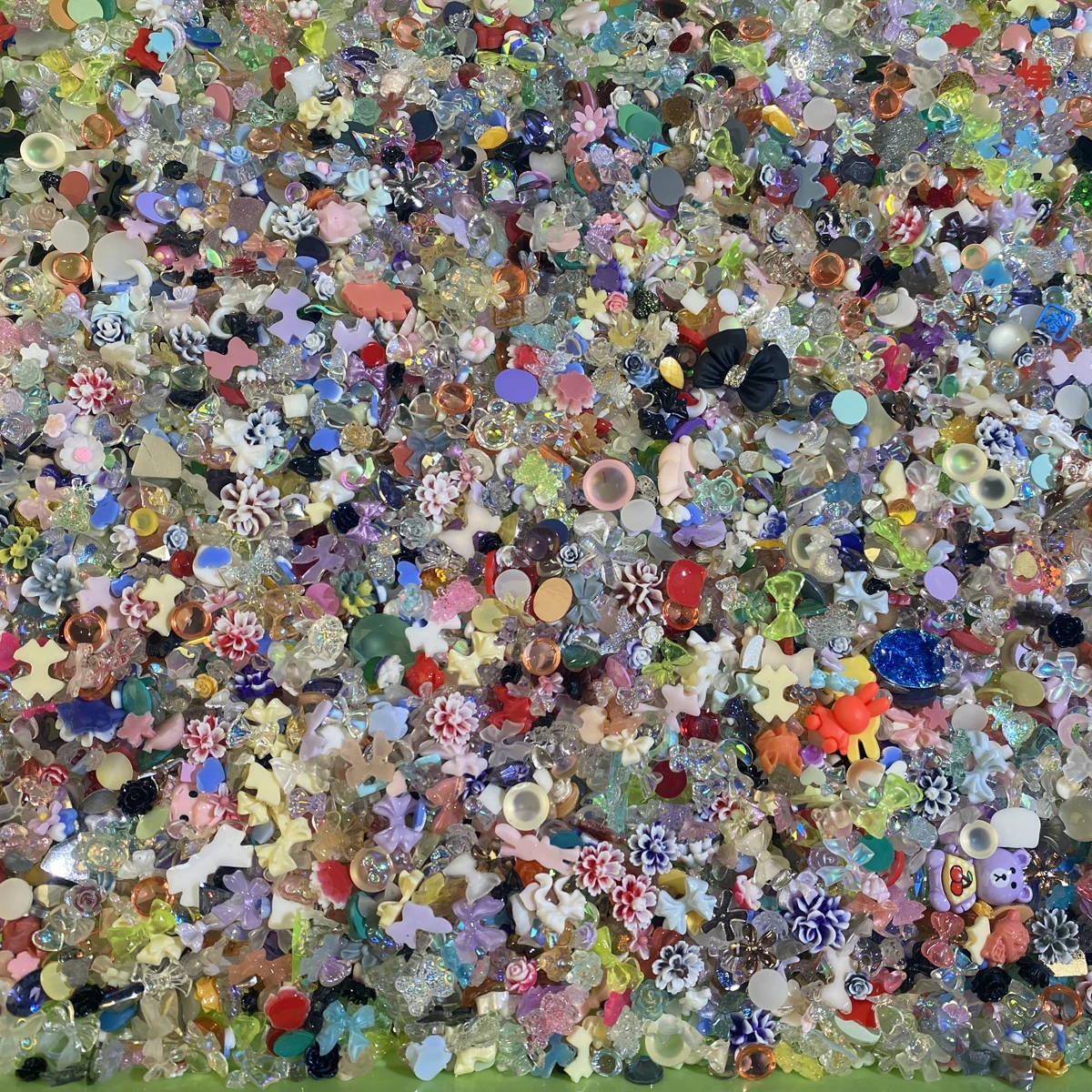 50g 3D สุ่มผสมเรซิ่นโบว์/เพชรเล็บ Charms การ์ตูนรูปร่างหัวใจ/ดอกไม้/ริบบิ้น Rhinestone น่ารัก DIY อุปกรณ์แต่งเล็บ
