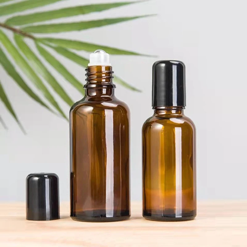 Bottiglia di palla di rotolamento colorata per tè bottiglia di soluzione originale cosmetica piccola bottiglia di campione bottiglia di vetro di olio essenziale a prova di luce