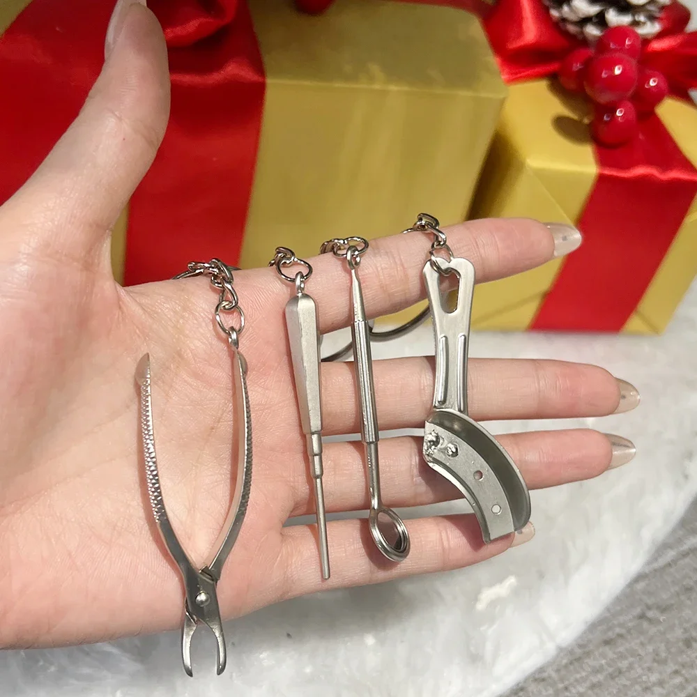 

Tooth Model Shape Key Holder Dental Clinic Keychain Mouth Mirror Pliers Shape Dentist Decoration Stainless Steel Key Chains