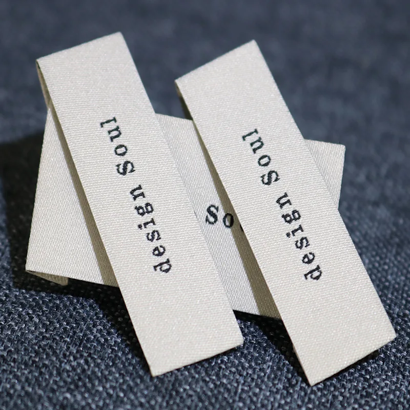 

Personalized Sew-On Labels 2x6cm, Custom Woven Clothing Tags for Branding Apparel, DIY Crafts, Bags and Dresses