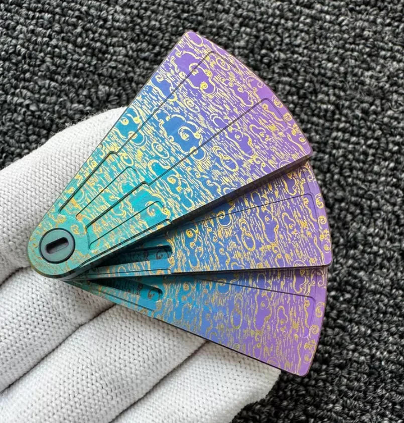 Used EDC MOT Xiaoyao Fan Titanium Rainbow Auspicious Cloud Pattern Titanium Alloy Fidget Slider Decompression toy