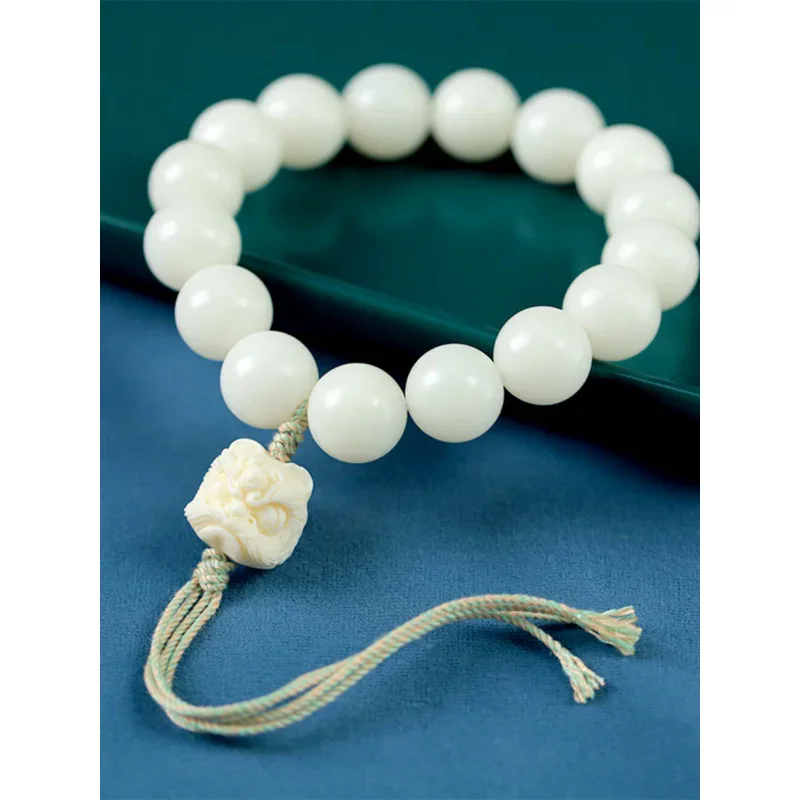 

Ivory Fruit Carving Lion Dance Bracelet Female White Bodhi Root Hand-held Antique Tassel Rosary Girlfriend Hand Twisted Gift