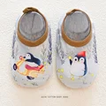 pingüino gris