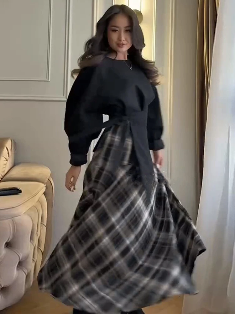 Komplety damskie w kratę: top z dekoltem okrągłym i podkreśloną talią oraz długa spódnica w kształcie litery A, nowa kolekcja wiosna 2026, codzienne ubrania damskie.