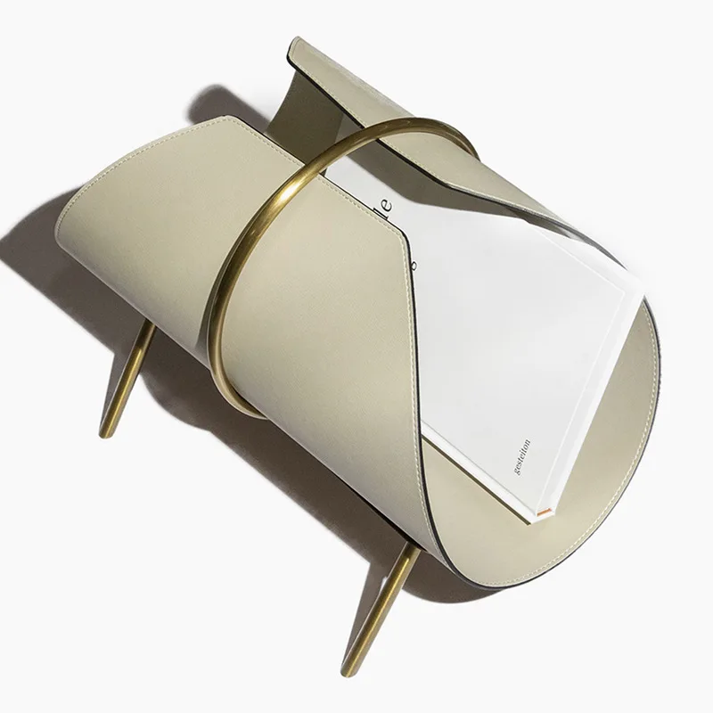 

Modern light luxury metal leather magazine shelf bookshelf ornament model room sales office homestay