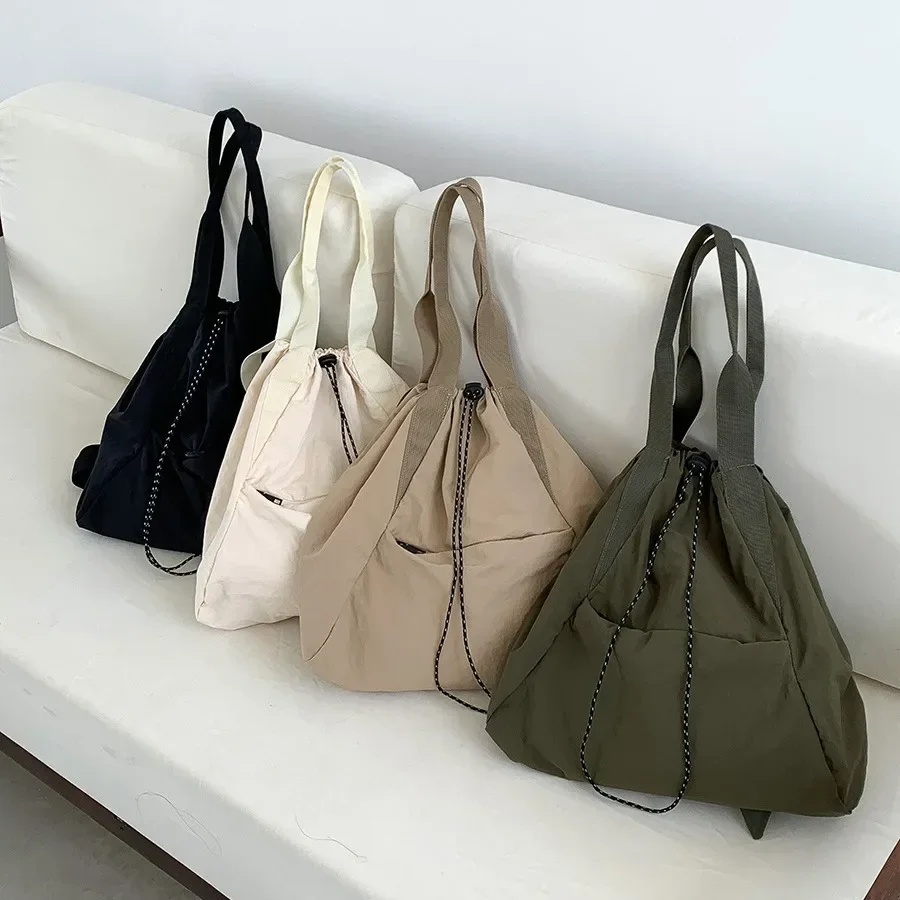 Mochilas coreanas con cordón para mujer, bolso de hombro de gran capacidad, mochila escolar de nailon, bolsos de mano de viaje informales para mujer