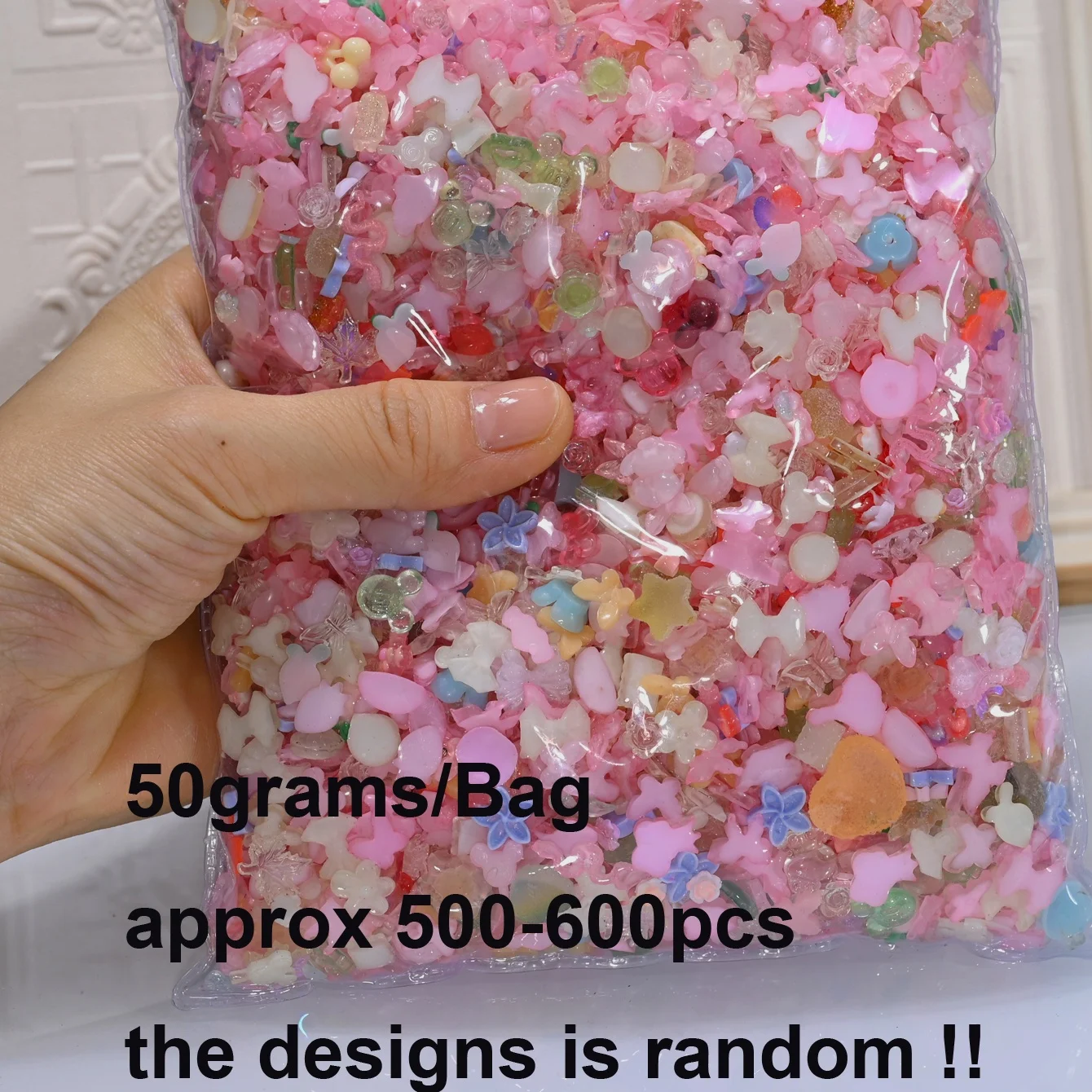 500-600 Uds 50g 3D mezclado lindo dibujos animados encantos de uñas resina flor arco decoración de uñas manicura DIY funda de teléfono accesorios piezas