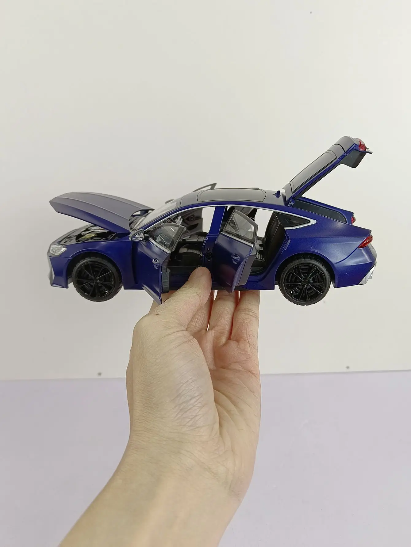 Modelo de coche de aleación deportiva RS7 1:24, vehículo de juguete de Metal fundido a presión, colección de sonido y luz de simulación, juguete para regalo para niños, Motor para niño