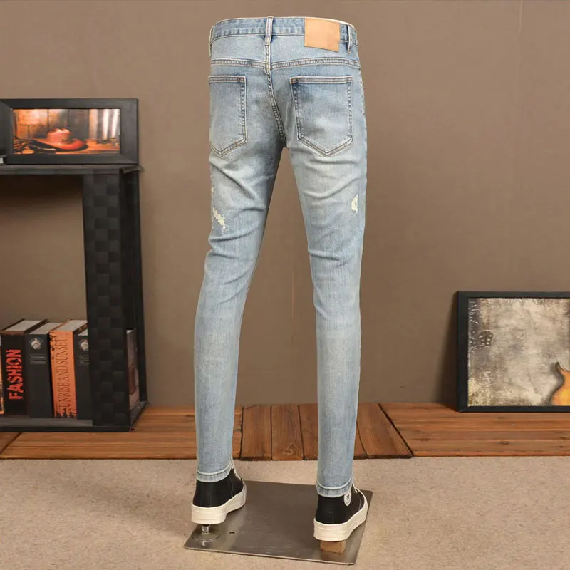 Street Fashion Jeans da uomo Retro Blue Stretch Skinny Fit Jeans strappati Vintage da uomo pantaloni in Denim Hip Hop firmati dipinti Hombre