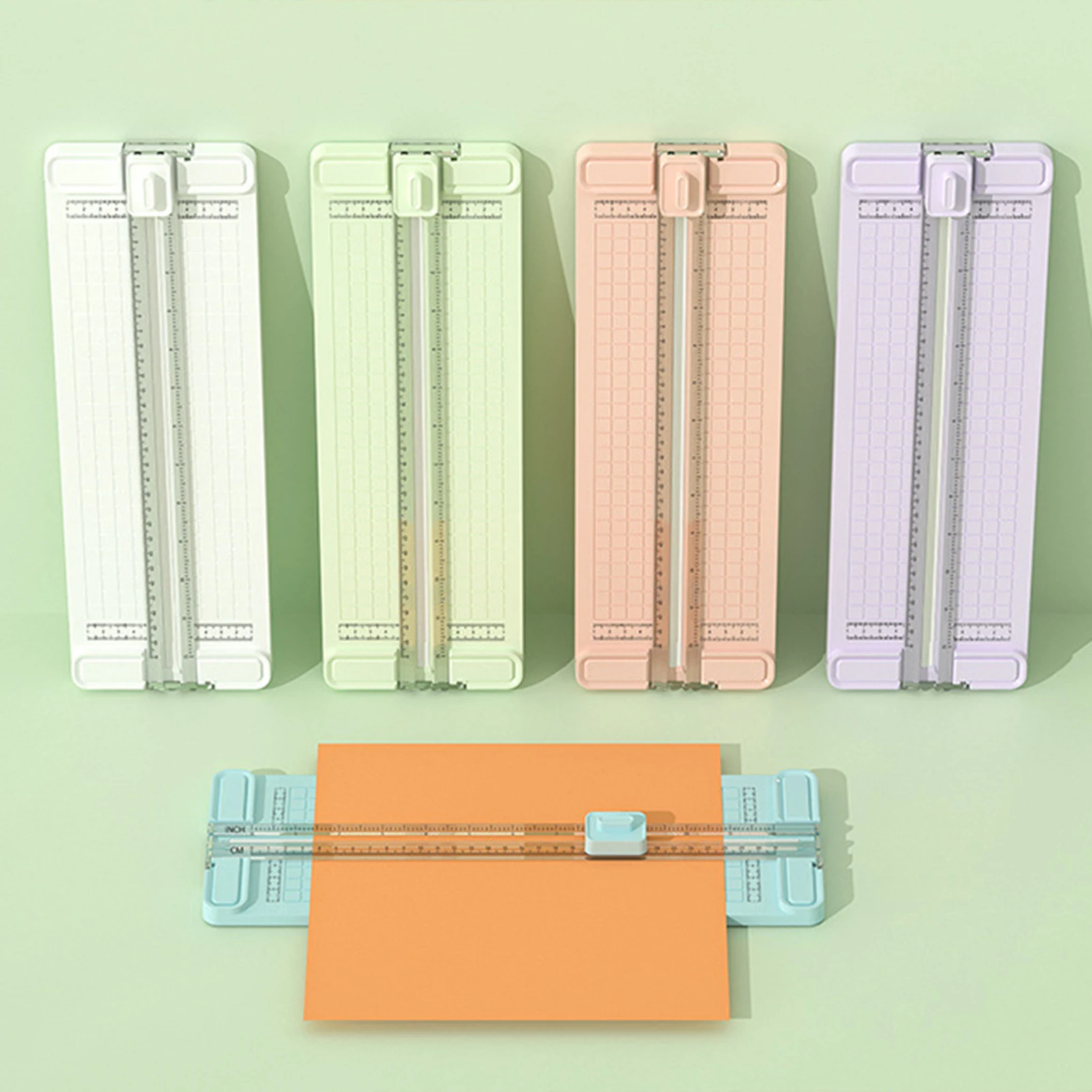 

4 in 1 Multifunctional Paper Cutter Manual Paper Trimmer Craft Paper Cutter with 4 Style Scrapbooking Tool