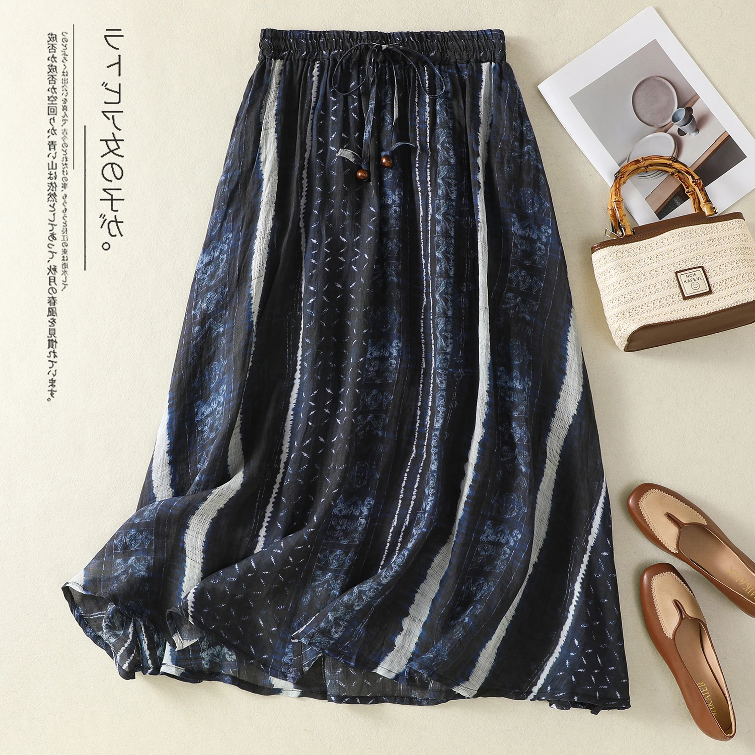 تنورة نسائية متوسطة الطول بقصة A-line فضفاضة ورقيقة للصيف، مصنوعة من القطن وألياف الليوسيل المطبوعة، بخصر متوسط الارتفاع