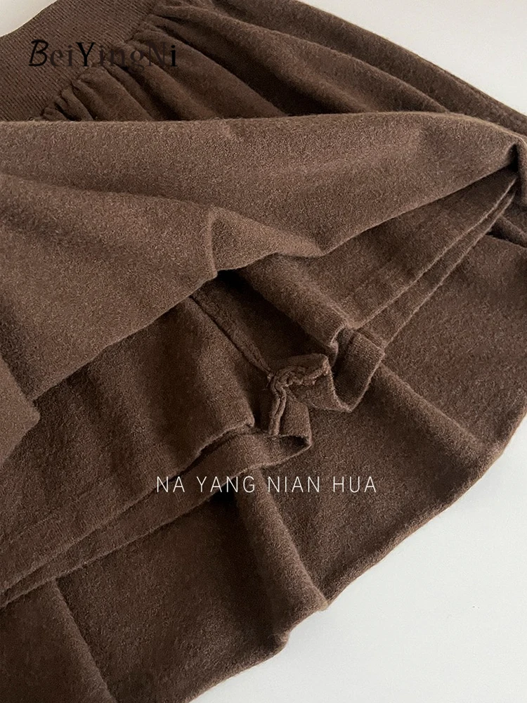 Beiyingni Donna Gonne a trapezio lavorate a maglia Tinta unita Moda coreana Elastico in vita Tutu Minigonna Francese Elegante Pianura Chic Gonne