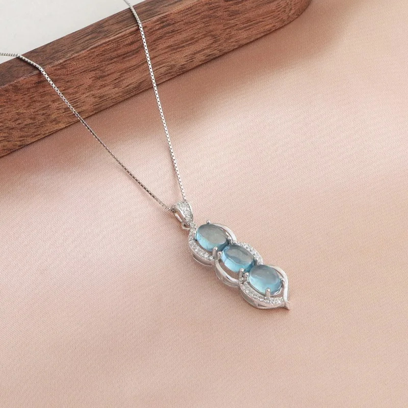 

Minar Perosonality Clear Blue Color Aquamarine Natural Stone Kidney Bean Pendant Necklaces for Women Silver Box Chain Chokers