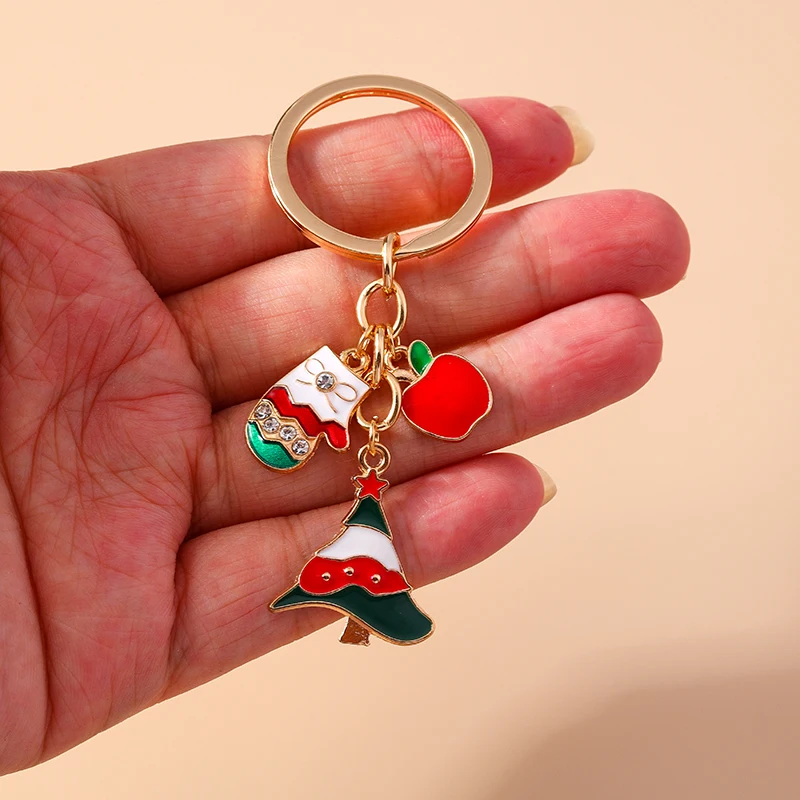 Modischer Weihnachts-Schlüsselanhänger aus Emaille mit Weihnachtsbaum-, Schneemann-, Weihnachtsmann- und Hirsch-Anhängern für Damen, Herren und Autoschlüssel. – Detail 2