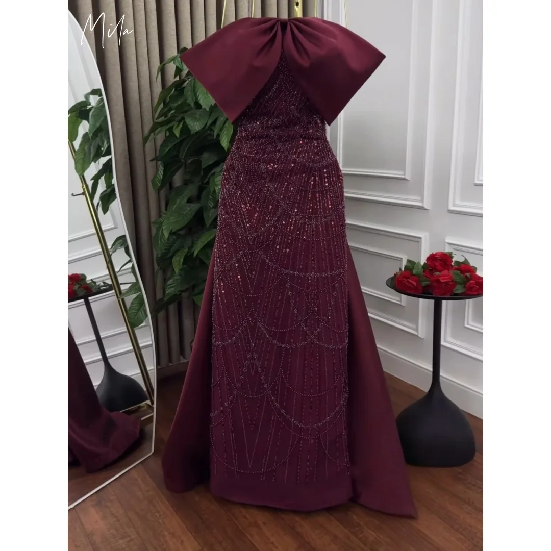 

Вечернее платье Mila Burgundy с атласным бантом на вырезе горловины, расшитым бисером лифом и накидкой-юбкой, индивидуальный пошив, коллекция 2026