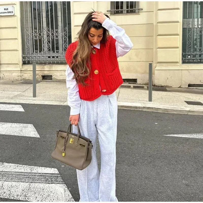 Chaleco de punto de primavera para mujer, chaleco de punto elegante a la moda para mujer, suéter informal rojo sin mangas con cuello redondo y botones de Metal