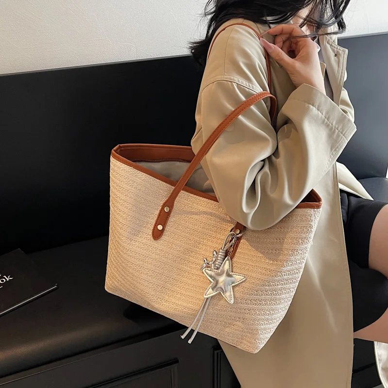 Rainbow-colored straw shoulder bag for women, suitable for beach vacations, spacious woven bucket tote