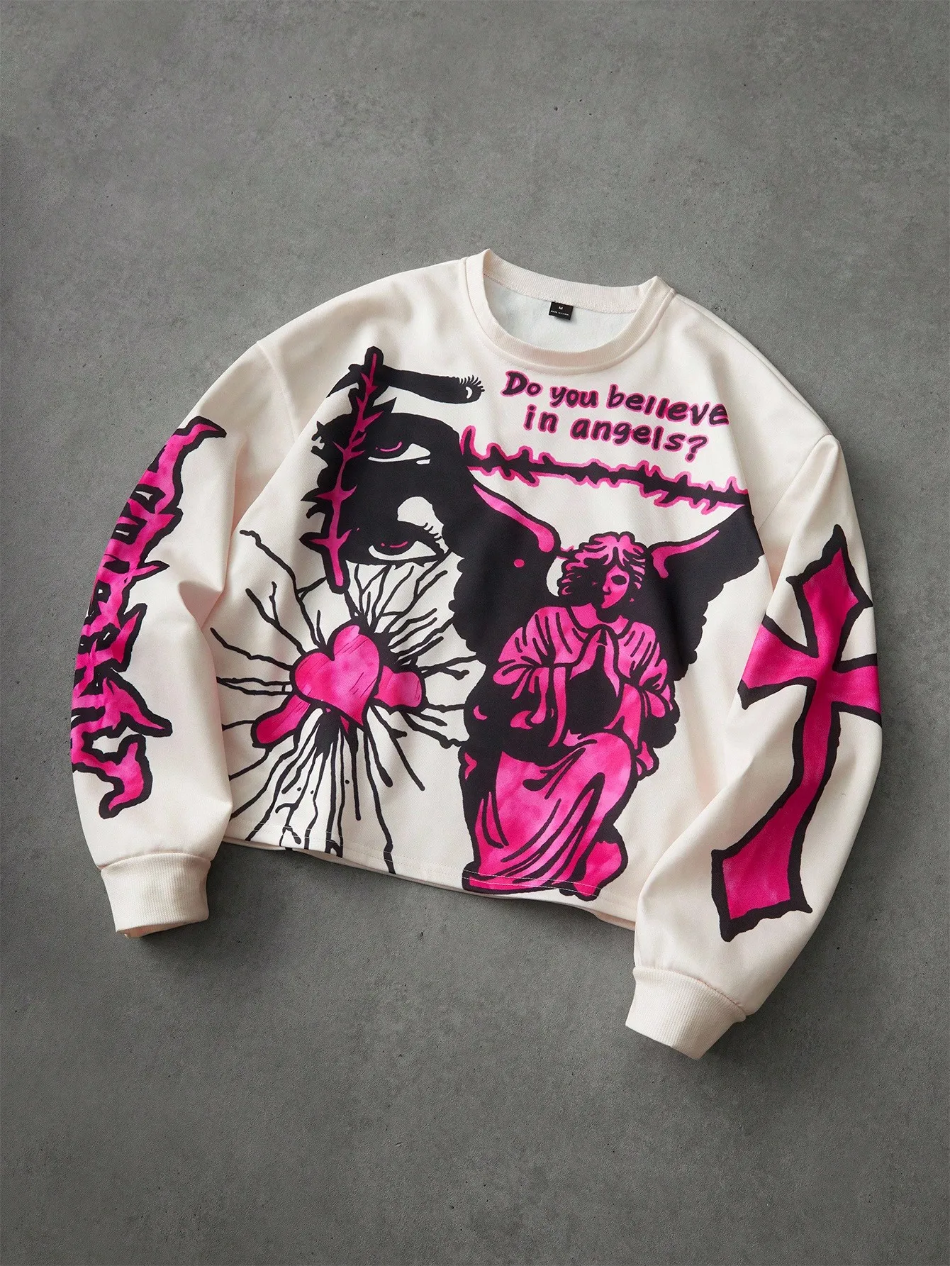 

Cream Graphic Print Oversized Sweatshirt with Angel Motif and Cross Design