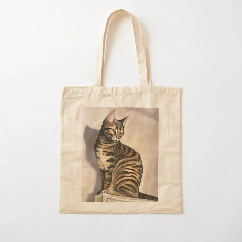 

Portrait of a Tabby Cat warming itself in the sunshine Tote Bag canvas tote bags bag for beach bag luxury women Canvas Tote