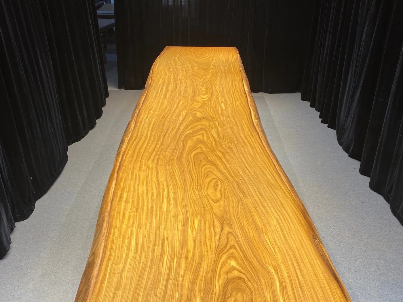 Exclusive Design for Opulent Statement Tables Luxury African Teak Slab with Recurved Live Edge