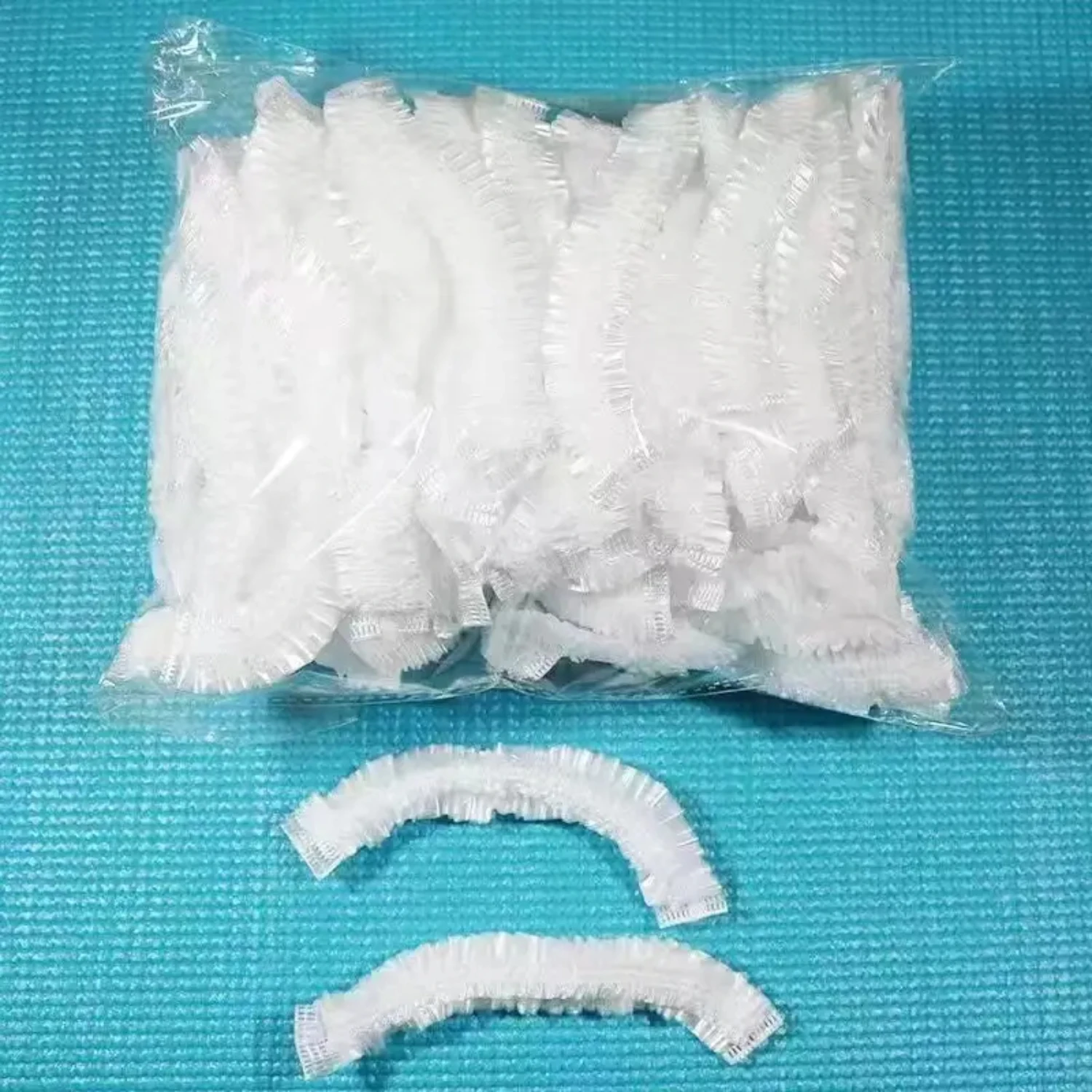 

Thickened Waterproof Solid Color Disposable Shower Cap 50pcs for Bath Use, Durable Hair Protection and Hygiene, Convenient and H