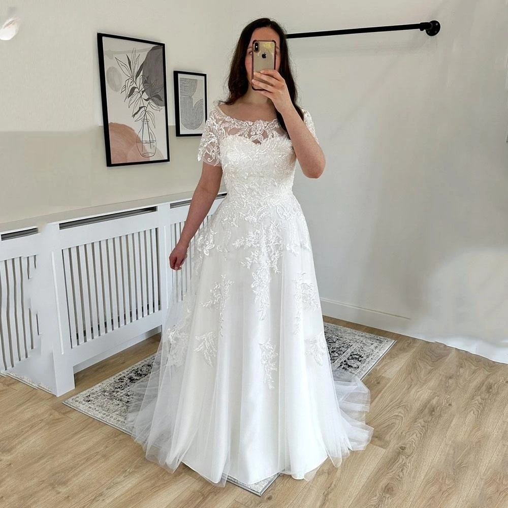 

Boat Neck Wedding Dress For Women 2023 Short Sleeves Lace Appliques Backless Tulle Simple Customize To Measures Elegant Robe