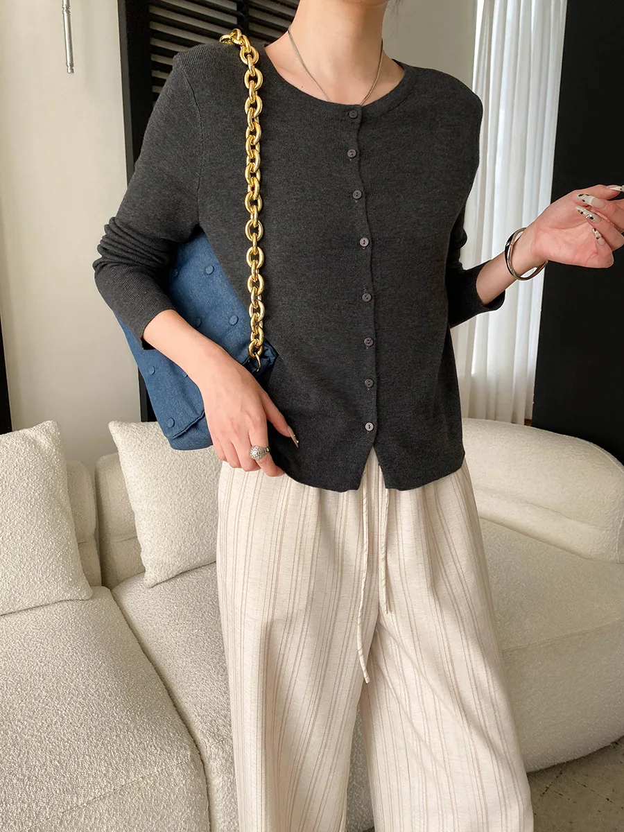 

Spring women's casual solid color round neck slimming knitted camisole cardigan two-piece set