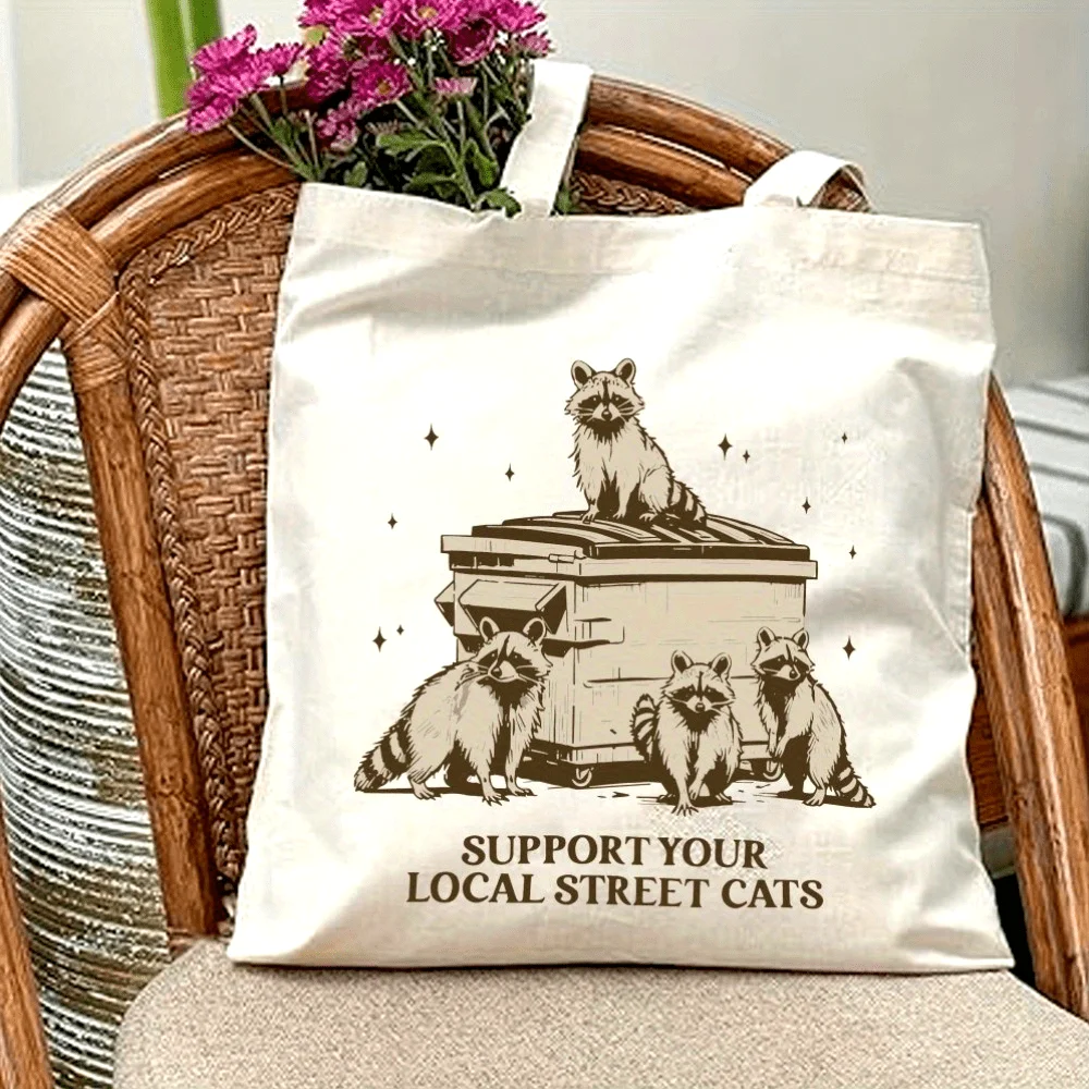 A Interesting raccoon Pattern printed canvas tote bag, suitable for daily use, shopping, school, and travel