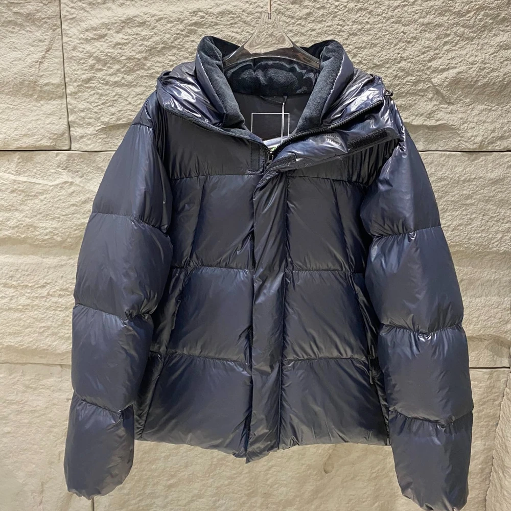 سترة نسائية شتوية فاخرة بتصميم خارجي مقاومة للبرد ودافئة متوسطة الطول مع ياقة سميكة من الفرو