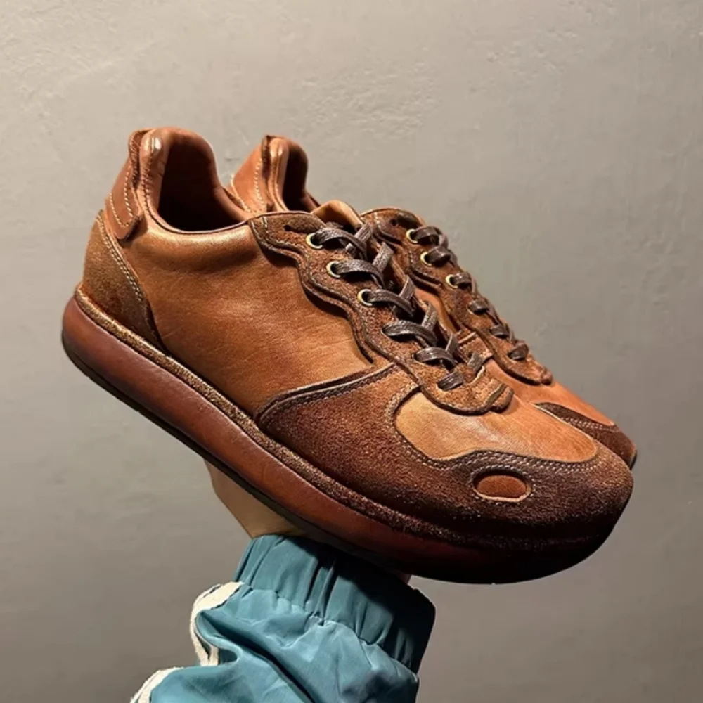 Retro-style Decheng men's brown low-top genuine leather casual shoes, versatile and suitable for various occasions.