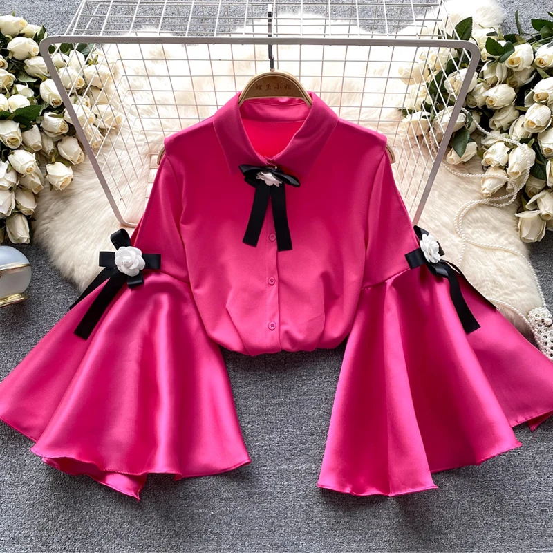 

Temperament: celebrity, high-end top, autumn dress, women's design, niche flared sleeve shirt, fashionable and versatile