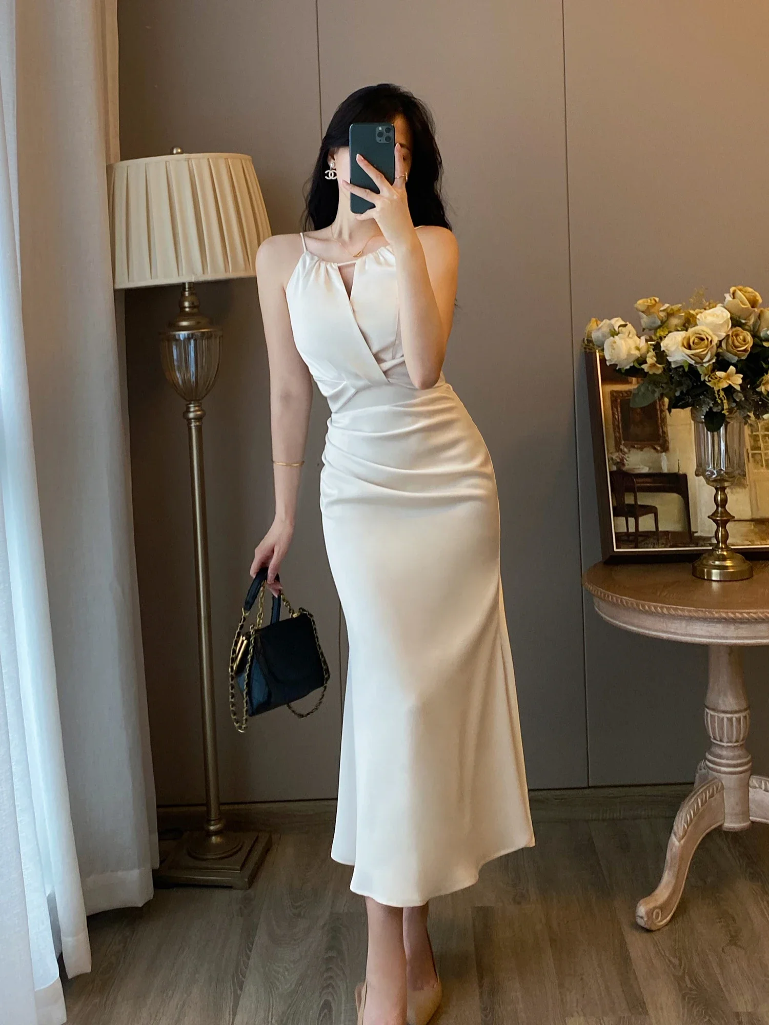 

French retro white neck sling dress women's spring and summer design sense satin fishtail skirt high sense long skirt