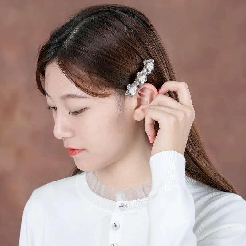 Nuova versione coreana della clip per capelli a molla con camelia di perle clip laterale con bordo in cristallo retrò accessori per capelli casual moda femminile