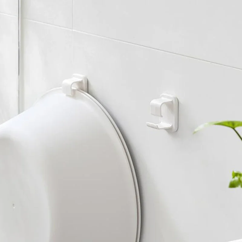 1 pz/2 pz lavabo gancio di stoccaggio Free-punch a parete lavabo palla da bagno gancio senza cuciture ventosa accessori per la conservazione del bagno