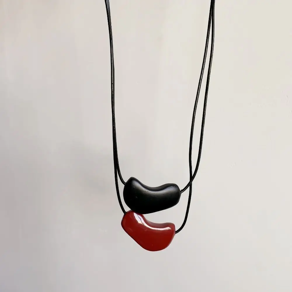 Minimalist Light Luxury Red Necklace Irregular Black Rope Sweater Chain Simple High-end Red Enamel Heart Pendant Accessories