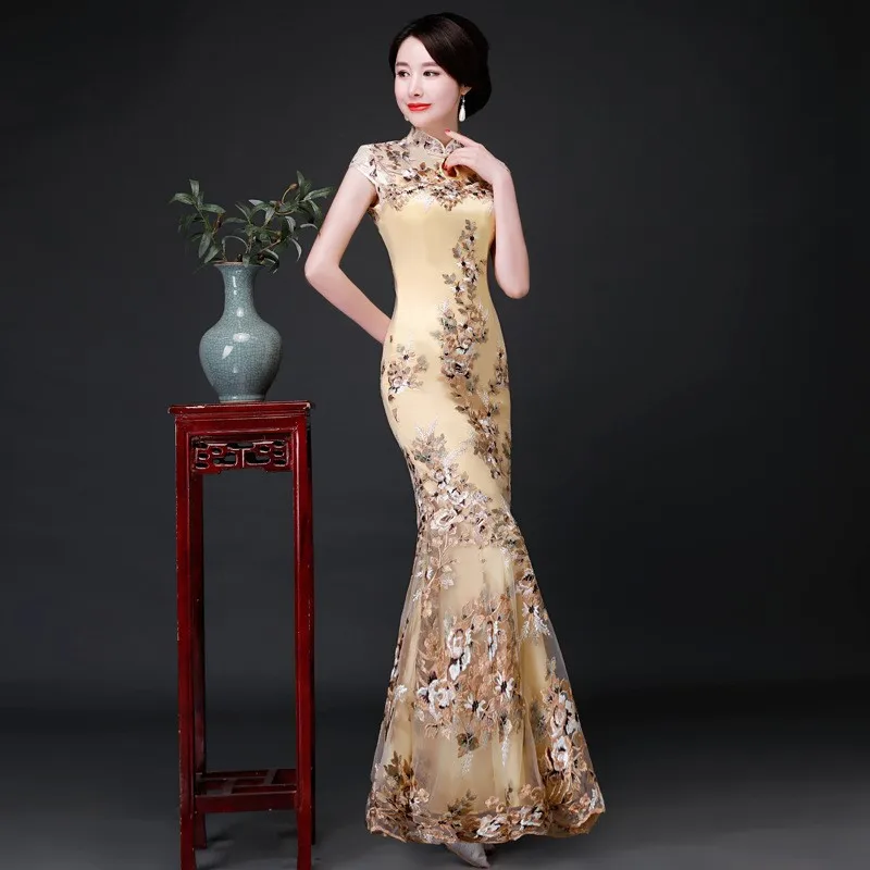 

Fish-tail cheongsam modified and fitted lace Chinese dress yellow catwalk performance