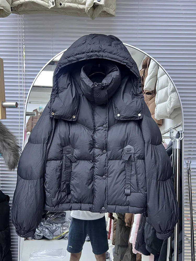 Versione coreana con coulisse sull'orlo ampio versatile piumino d'anatra bianca da donna inverno nuova tendenza piumino stile corto con cappuccio