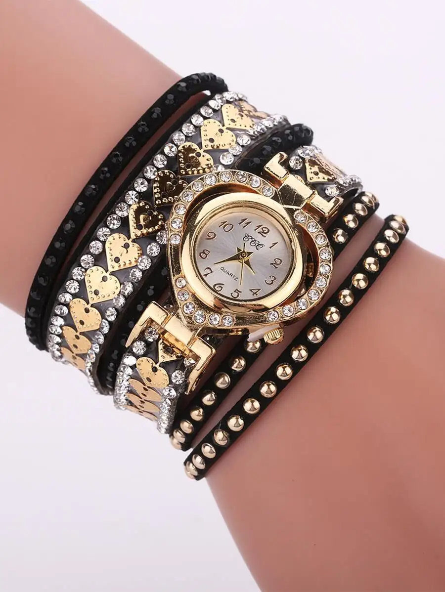 

Золотистые часы с сердечками из страз и черным кожаным ремешком