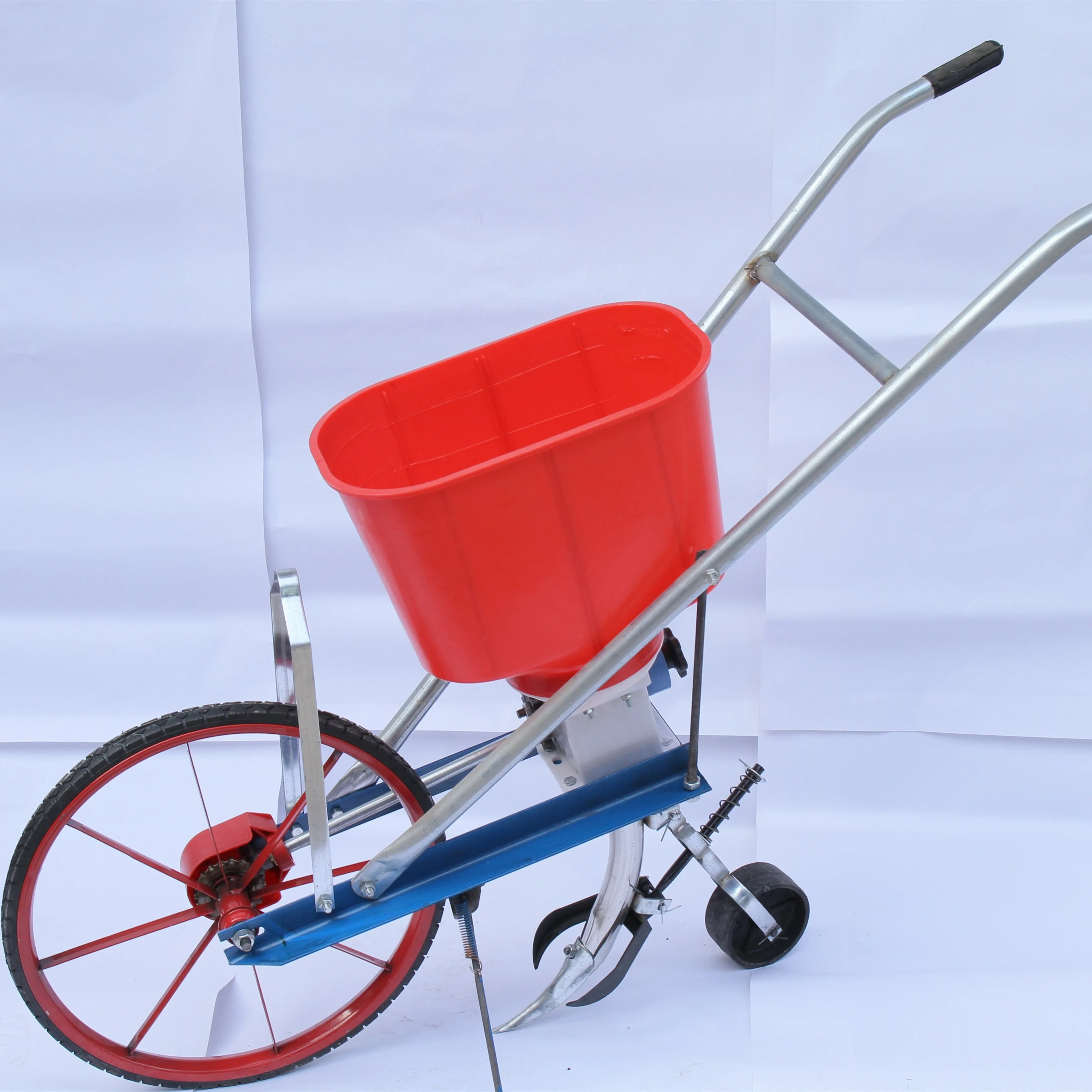 

2025 Hand-push type fertilizer application drill for spot planting and precise seeding. Small-sized.