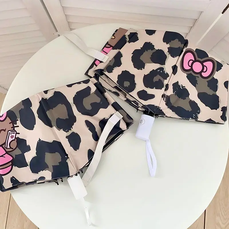 Sanrio Regenschirm Hawaii Black Skin Hello Kitty Sonnenschirm UV-beständiger Sonnenschirm Automatischer faltbarer Cyan Regenschirm Cartoon Kawaii