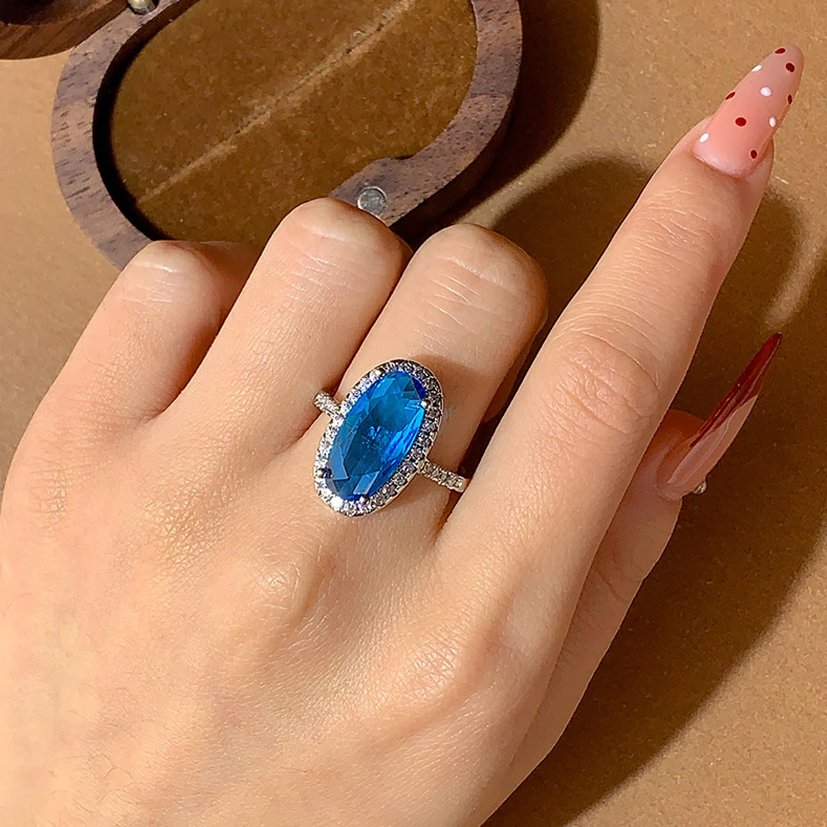 

New Micro-inlaid Egg-shaped Diamond Colored Blue Zircon Ring European and American Celebrities Luxurious Temperament Versatile