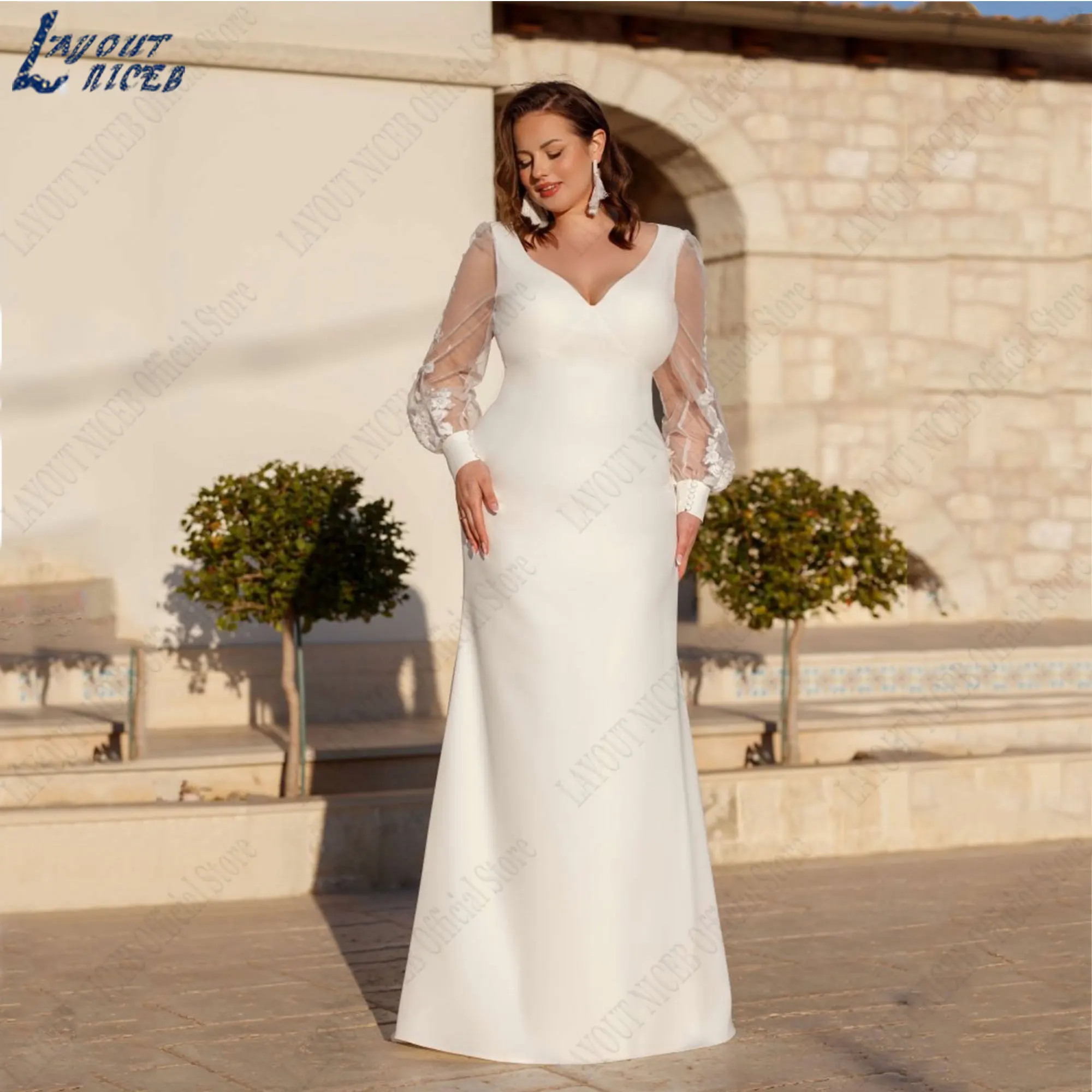 Suknie ślubne LAYOUT NICEB Mermaid Plus Size Appliques Satin V-Neck Bride Gown Backless Long Puff Sleeve Custom robe de mariéeLAYOUT NICEB Syrena Plus Size Suknie ślubne Aplikacje Satyna V-Neck Suknia panny młodej Bez