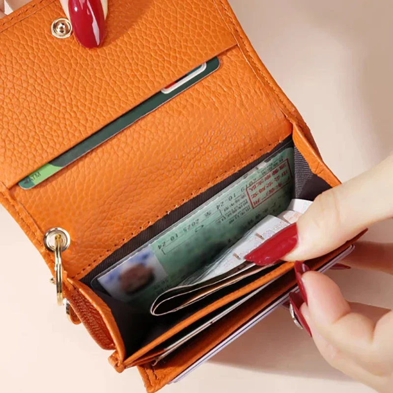 Dompet koin ซิปป้องกัน RFID แบบสั้นมีหลายสีแบบกระเป๋าเก็บบัตรมีซิปสไตล์ญี่ปุ่นแบบเกาหลีกระเป๋าสตางค์ขนาดเล็กของผู้หญิงหนังแท้แฟชั่น